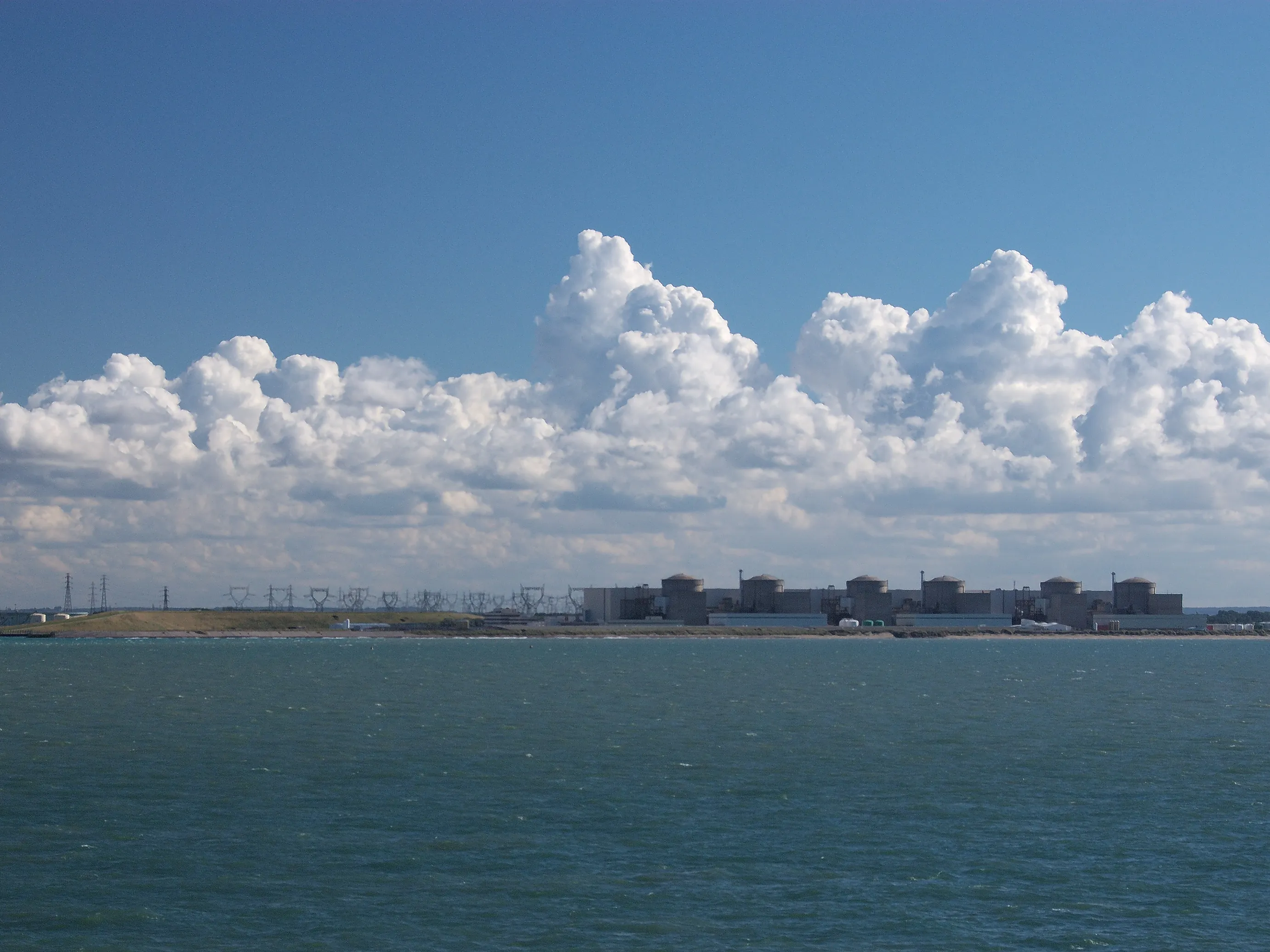 The six reactor blocks of Gravelines, France.s largest nuclear plant, seen from the sea